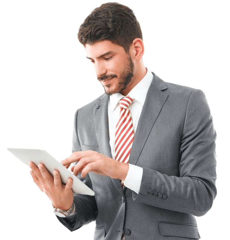 A man in a suit and tie using a tablet.
